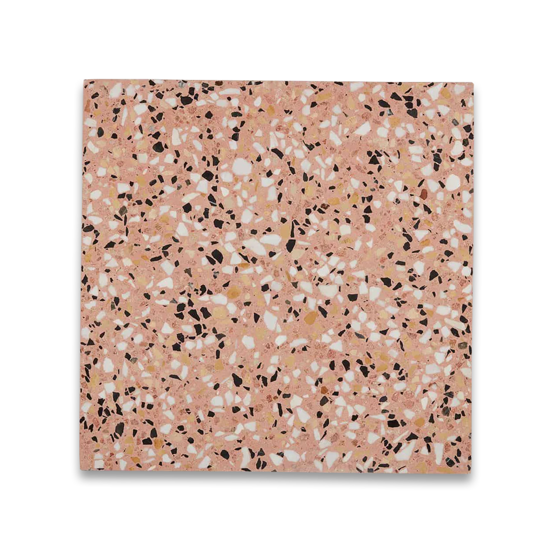 Terrazzo patterned tile with a pink background