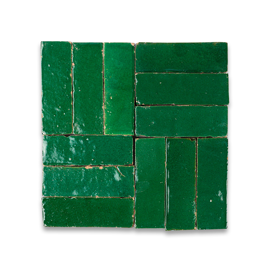 Green ceramic tiles arranged in a pattern on a white background