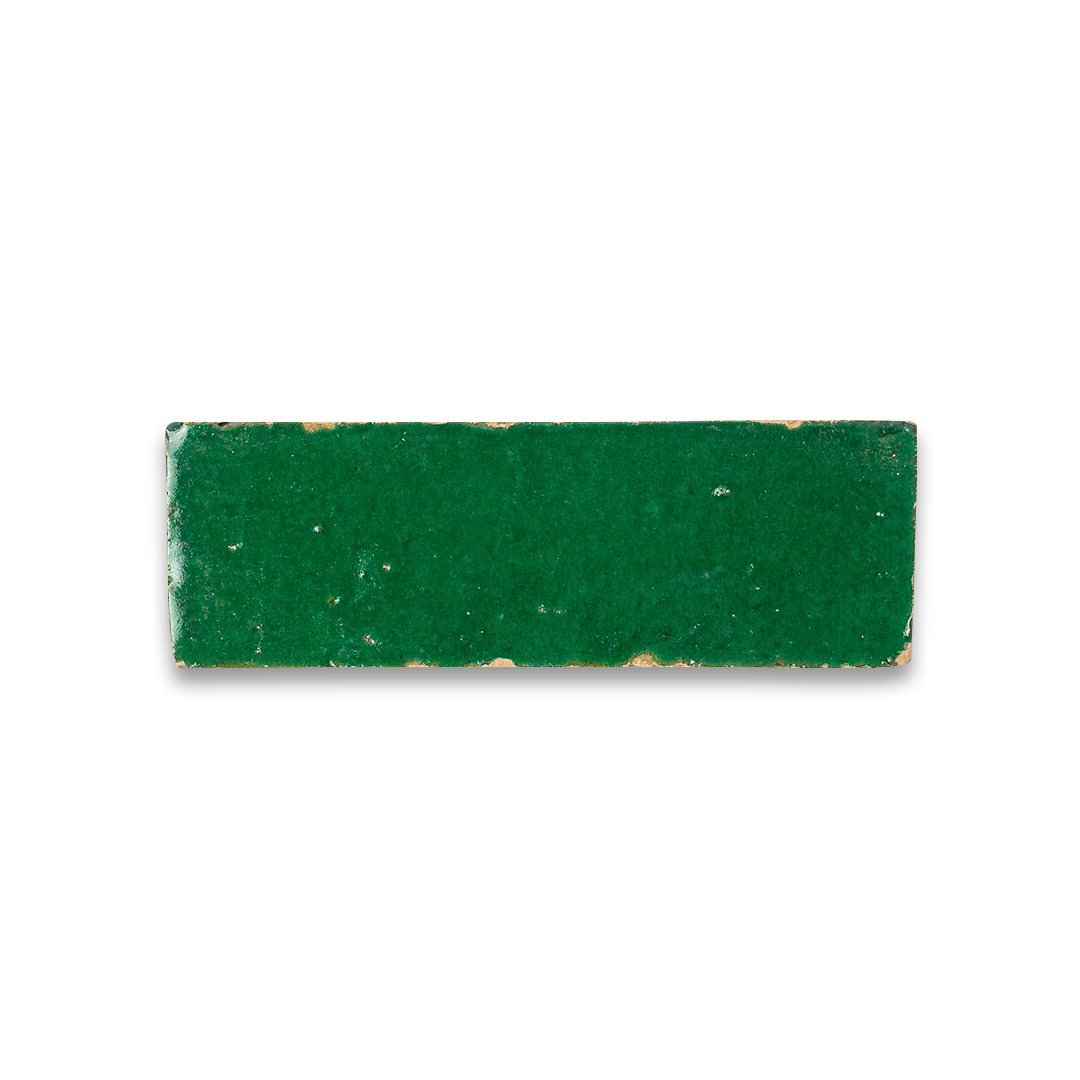 Green rectangular sponge on a white background