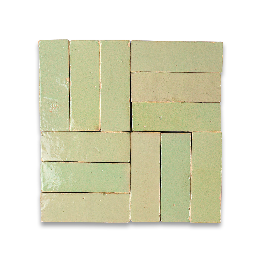 Square arrangement of green ceramic tiles on a white background
