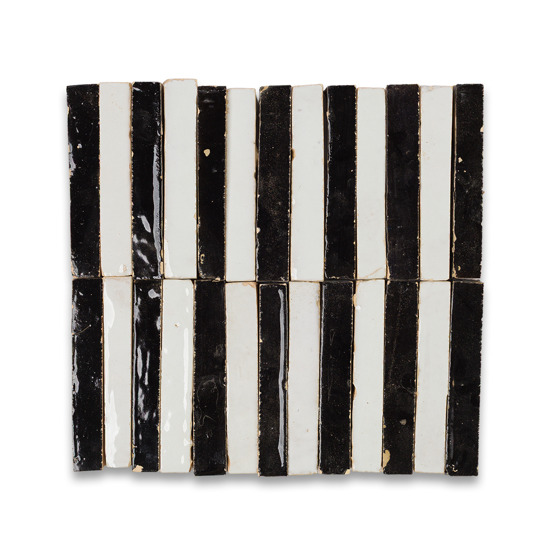 Black and white striped ceramic tile on a white background