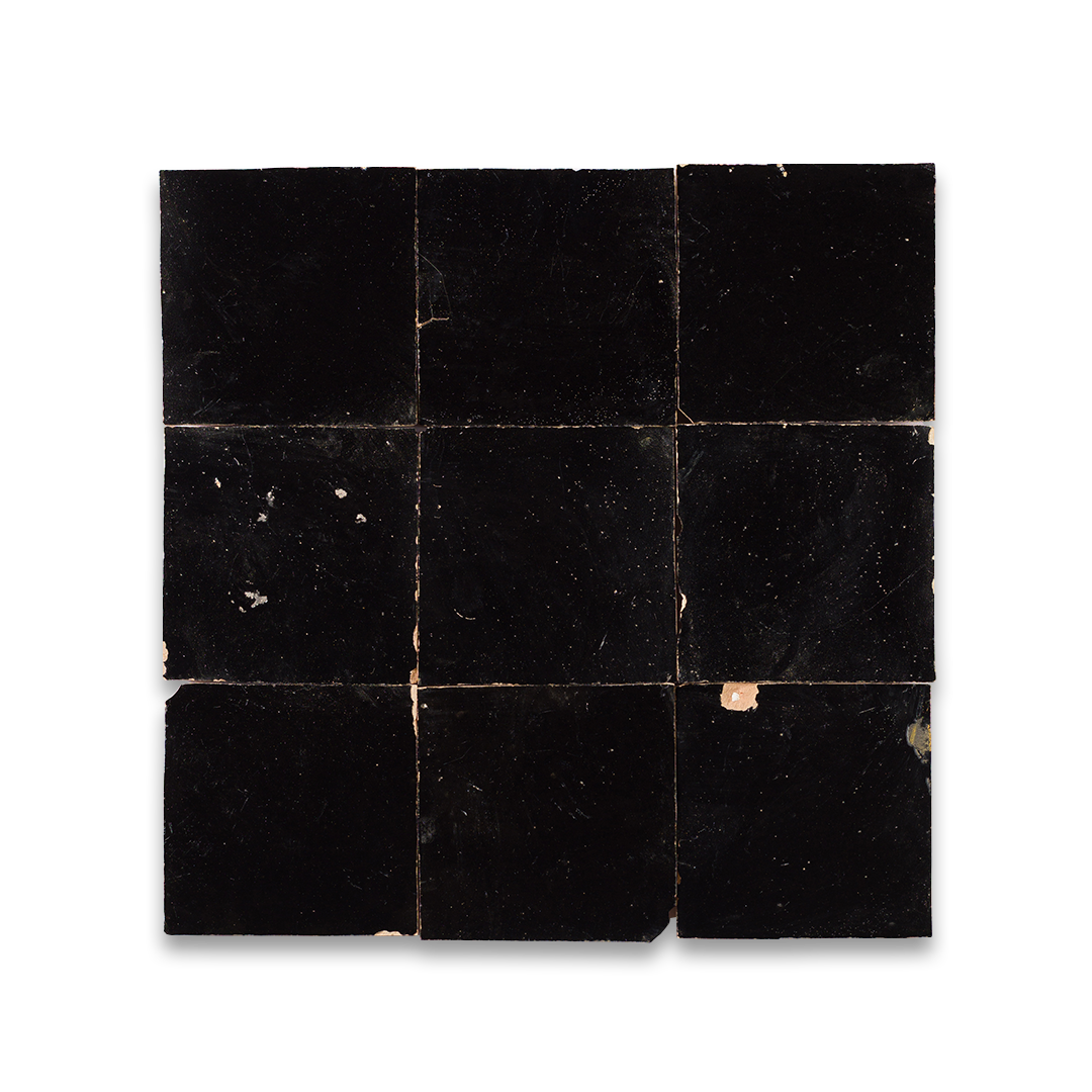 Black square tiles on a white background