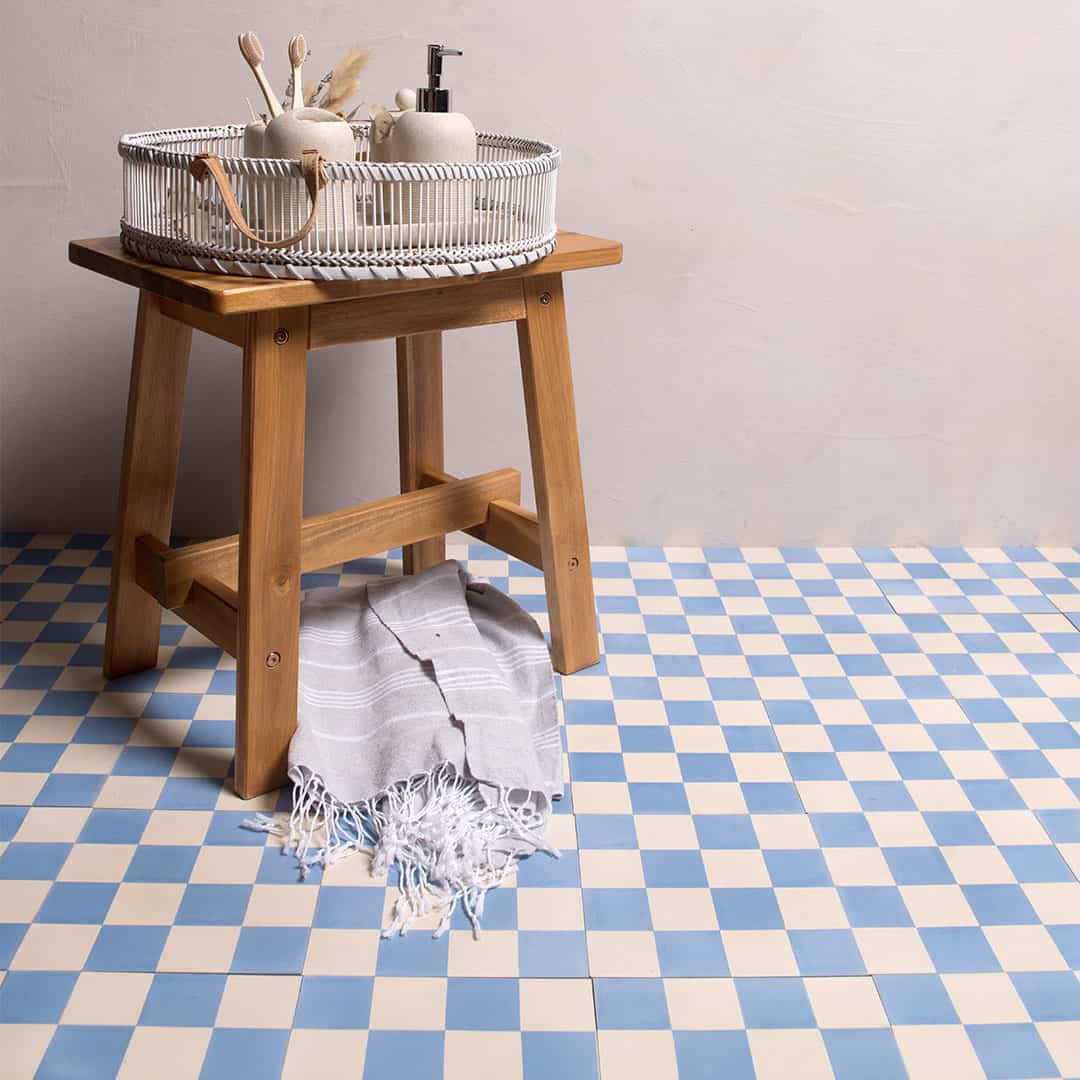 Square blue and white metro cement tile featuring a classic checkerboard pattern with a smooth matte finish, ideal for vintage flooring, wall décor, and modern interior design applications.