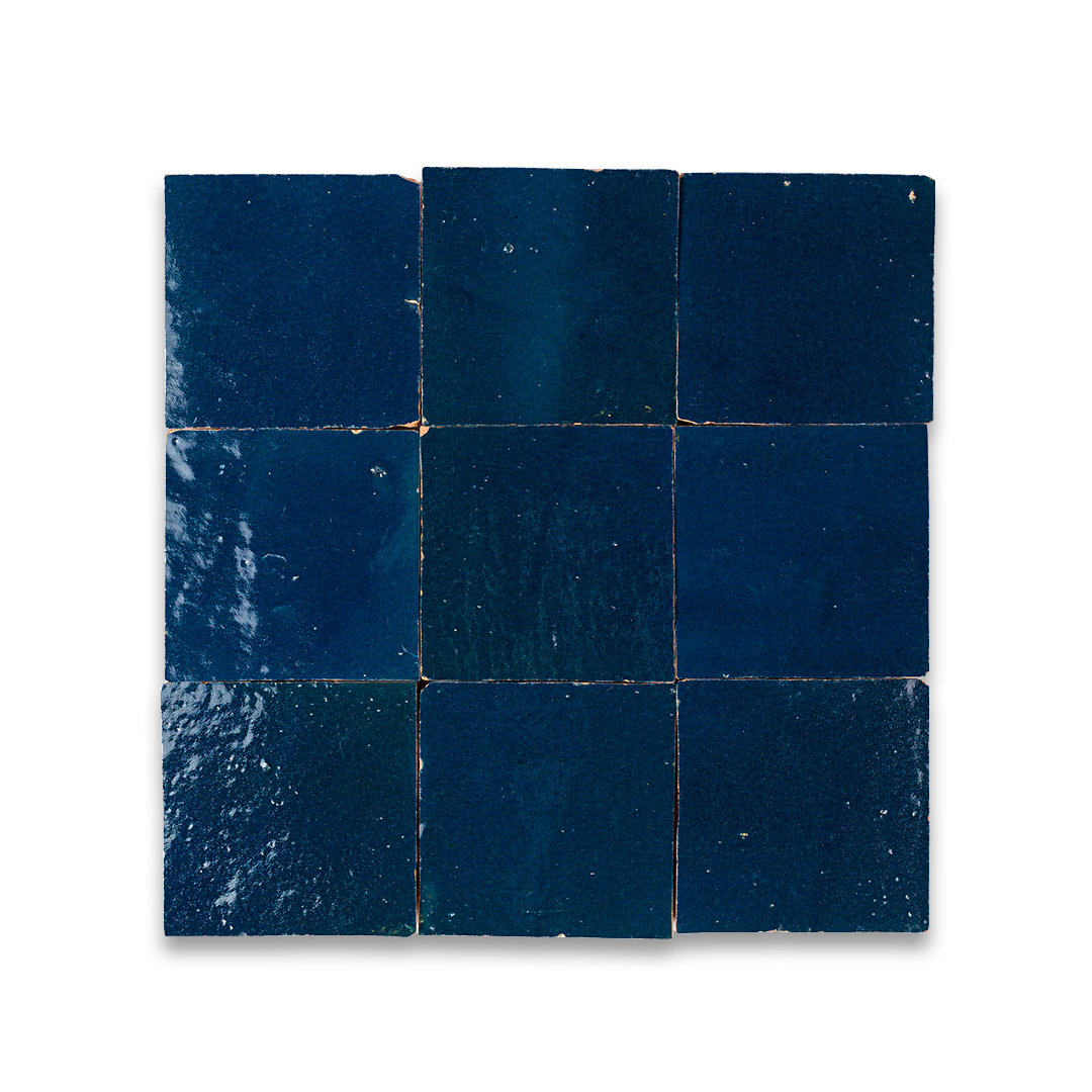 Nine blue square tiles on a white background
