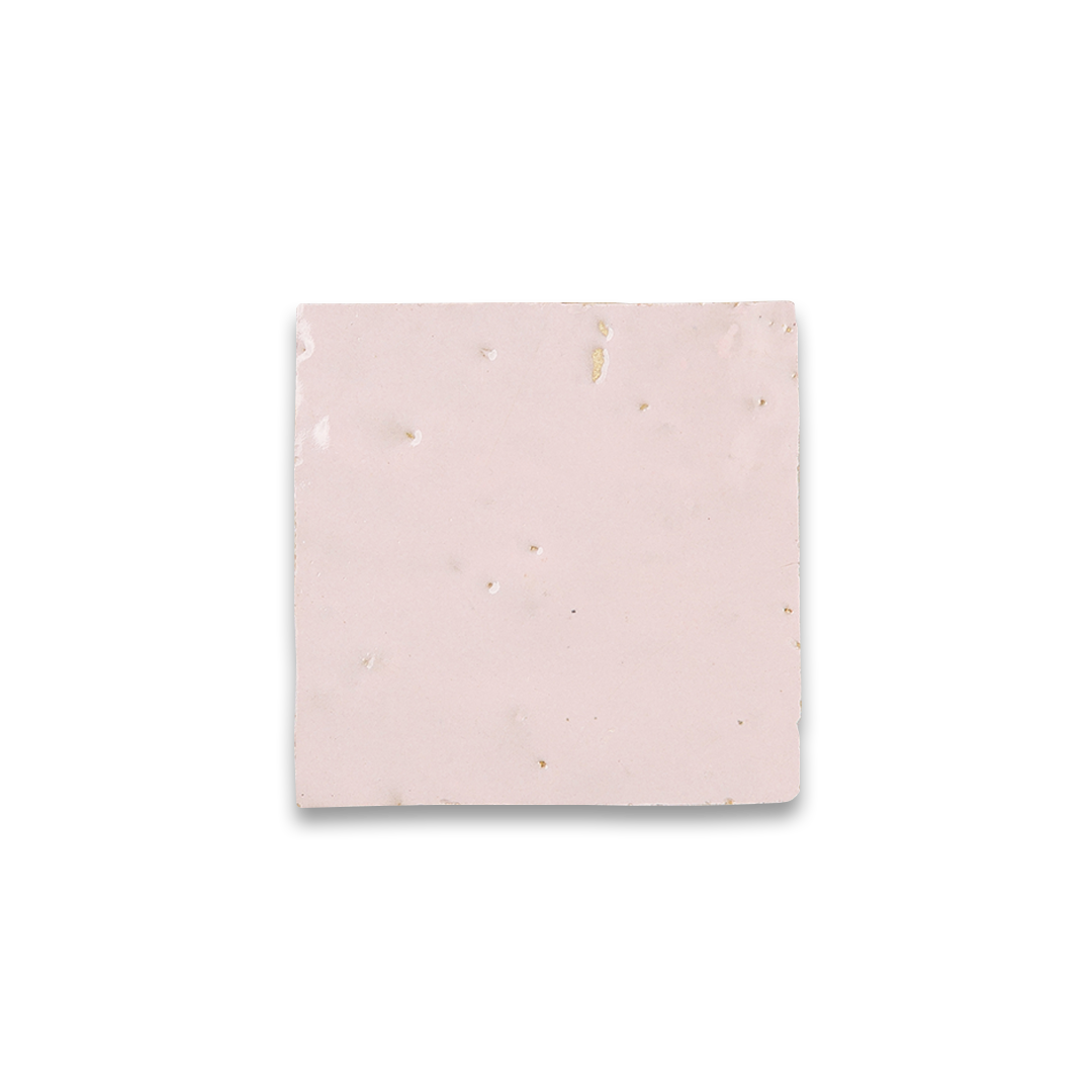 Pink square with gold accents on a white background