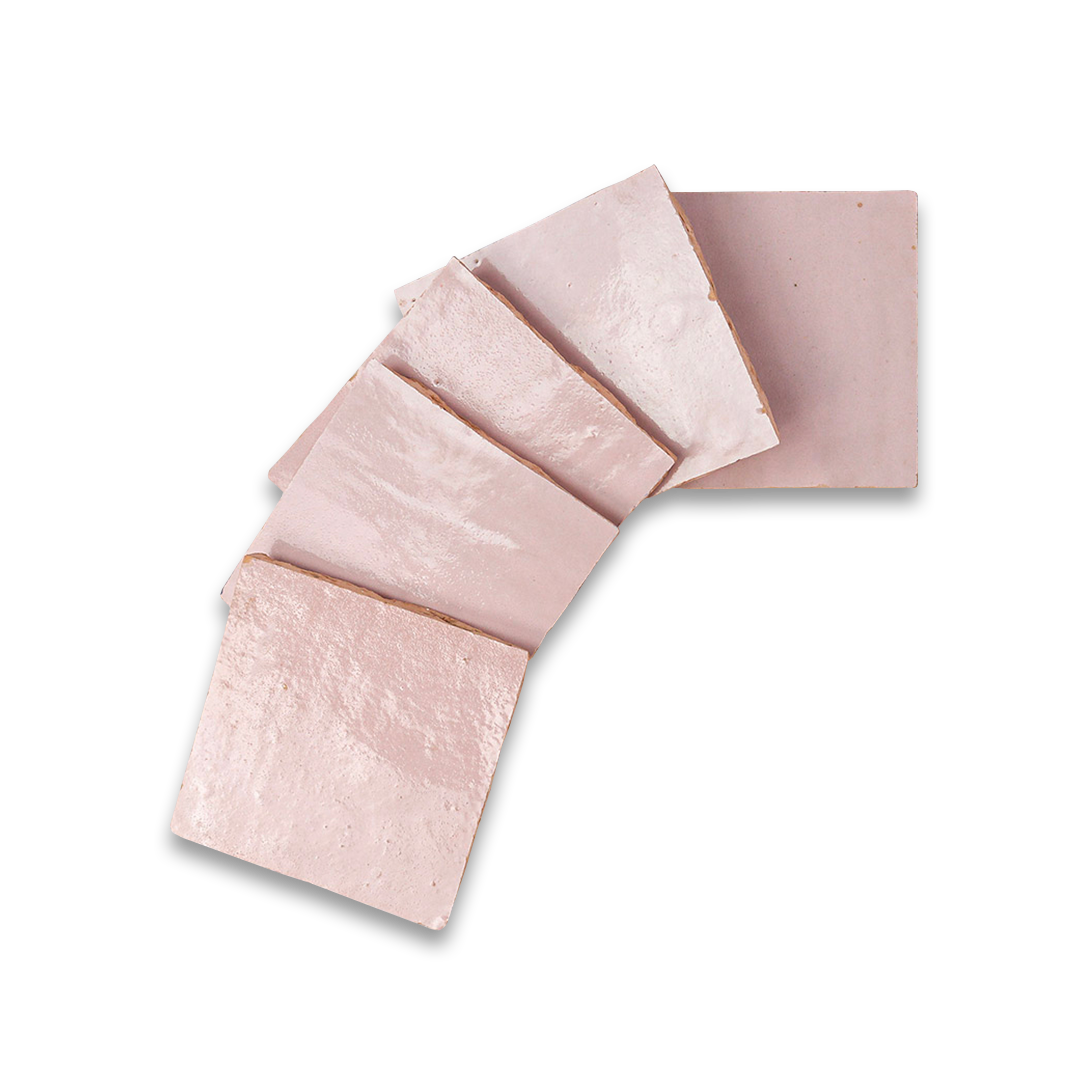 Pink textured soap with a rectangular bar on a white background