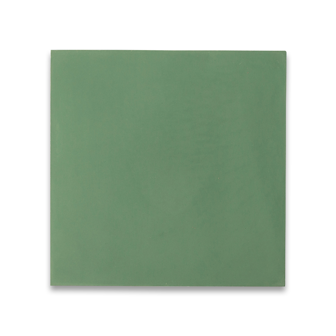 Smooth green square cement tile sheet with uniform matte finish, offering a minimalist and versatile design
