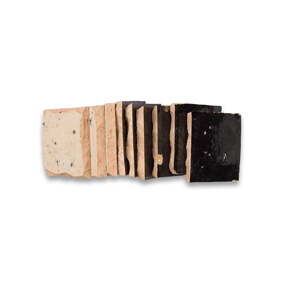 Set of black and beige stone slabs on a white background
