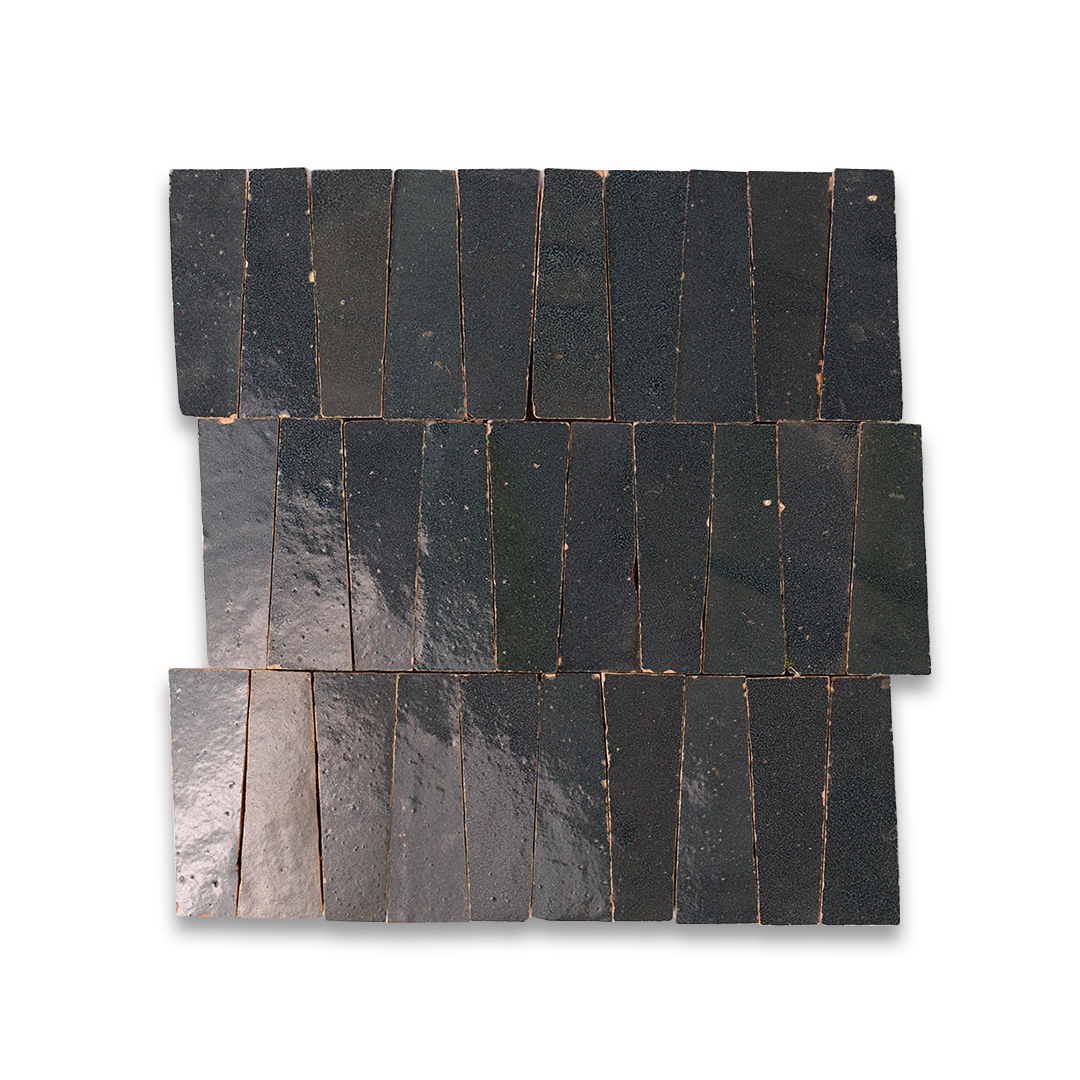 Set of black slate tiles on a white background