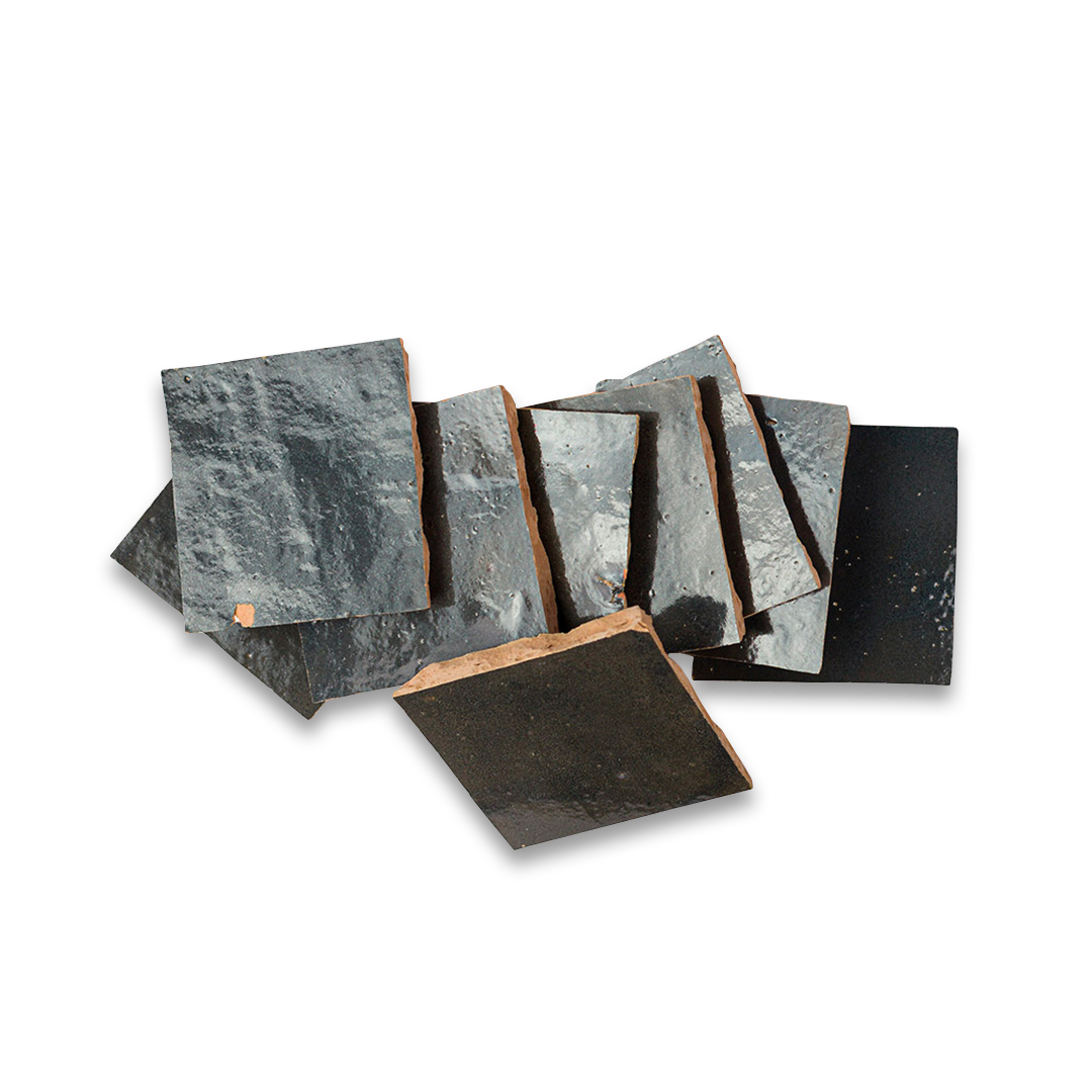 Set of square stone coasters on a white background