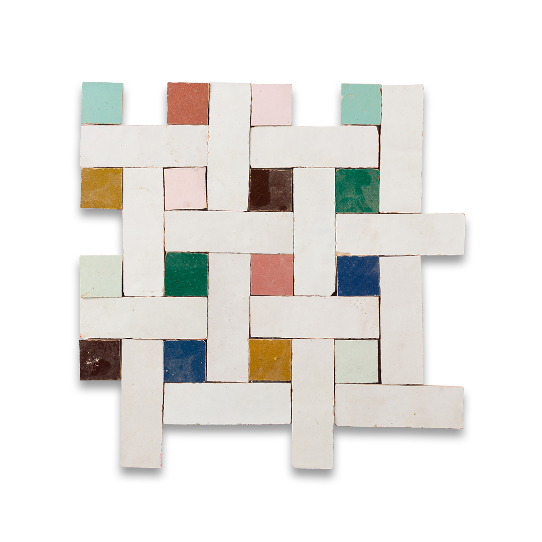  Pattern of rectangular white tiles interwoven with small square tiles in various colors, including red, pink, green, blue, yellow, brown, and mint.
