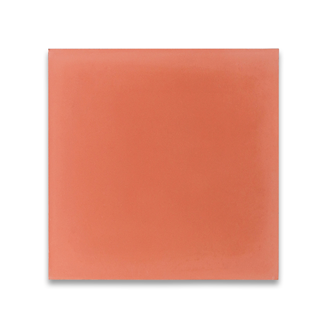 Square cement tile design in solid coral orange color with a smooth matte finish, ideal for rustic flooring, wall cladding, patios, or Mediterranean-inspired interior spaces.