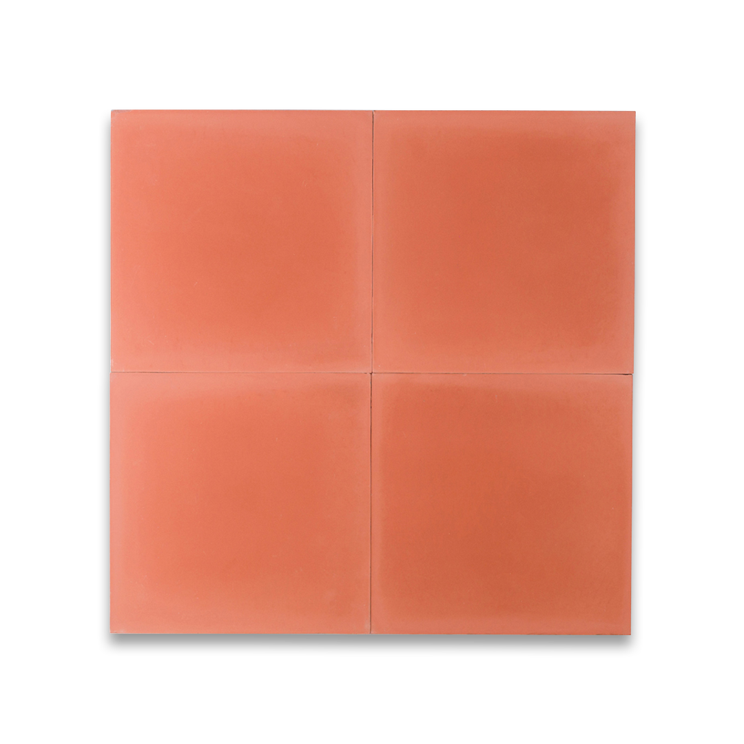 Square cement tile design in solid coral orange color with a smooth matte finish, ideal for rustic flooring, wall cladding, patios, or Mediterranean-inspired interior spaces.
