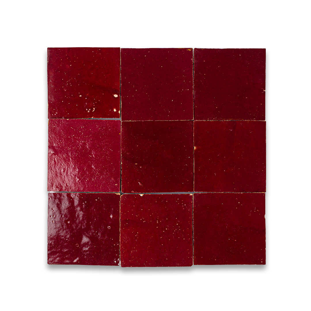 Red square tiles arranged in a grid pattern on a white background