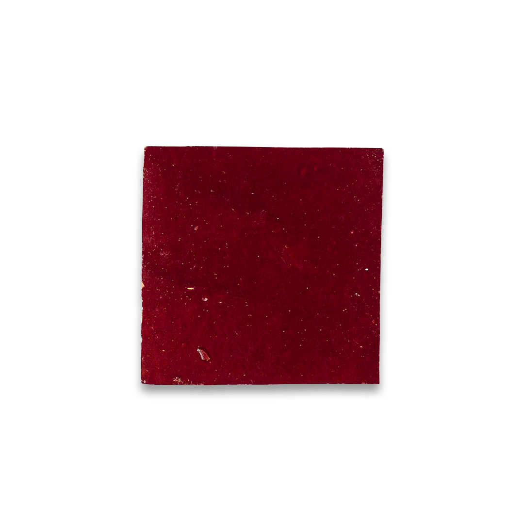 Square piece of red fabric on a white background