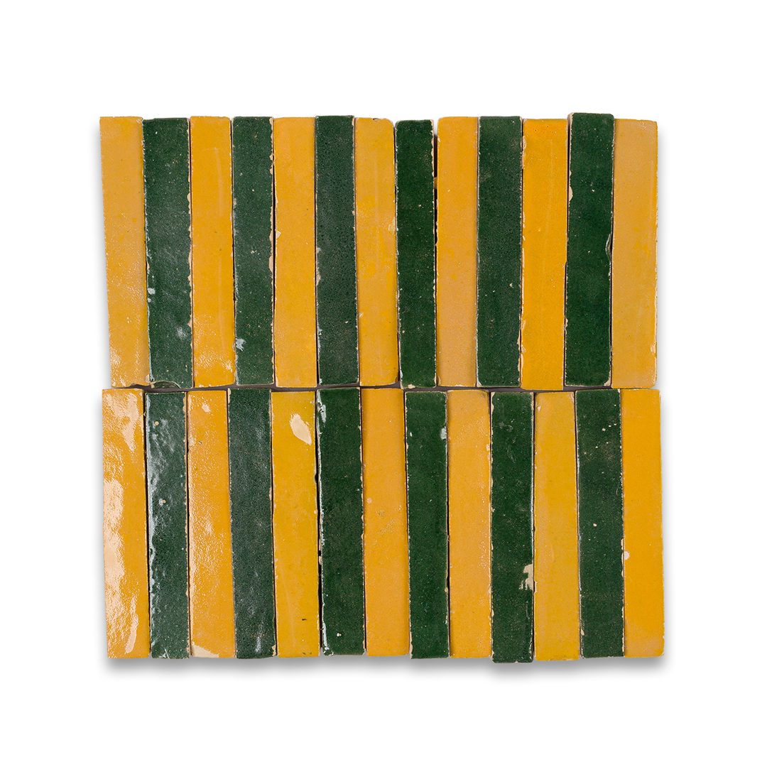 Mosaic pattern of green and yellow tiles on a white background