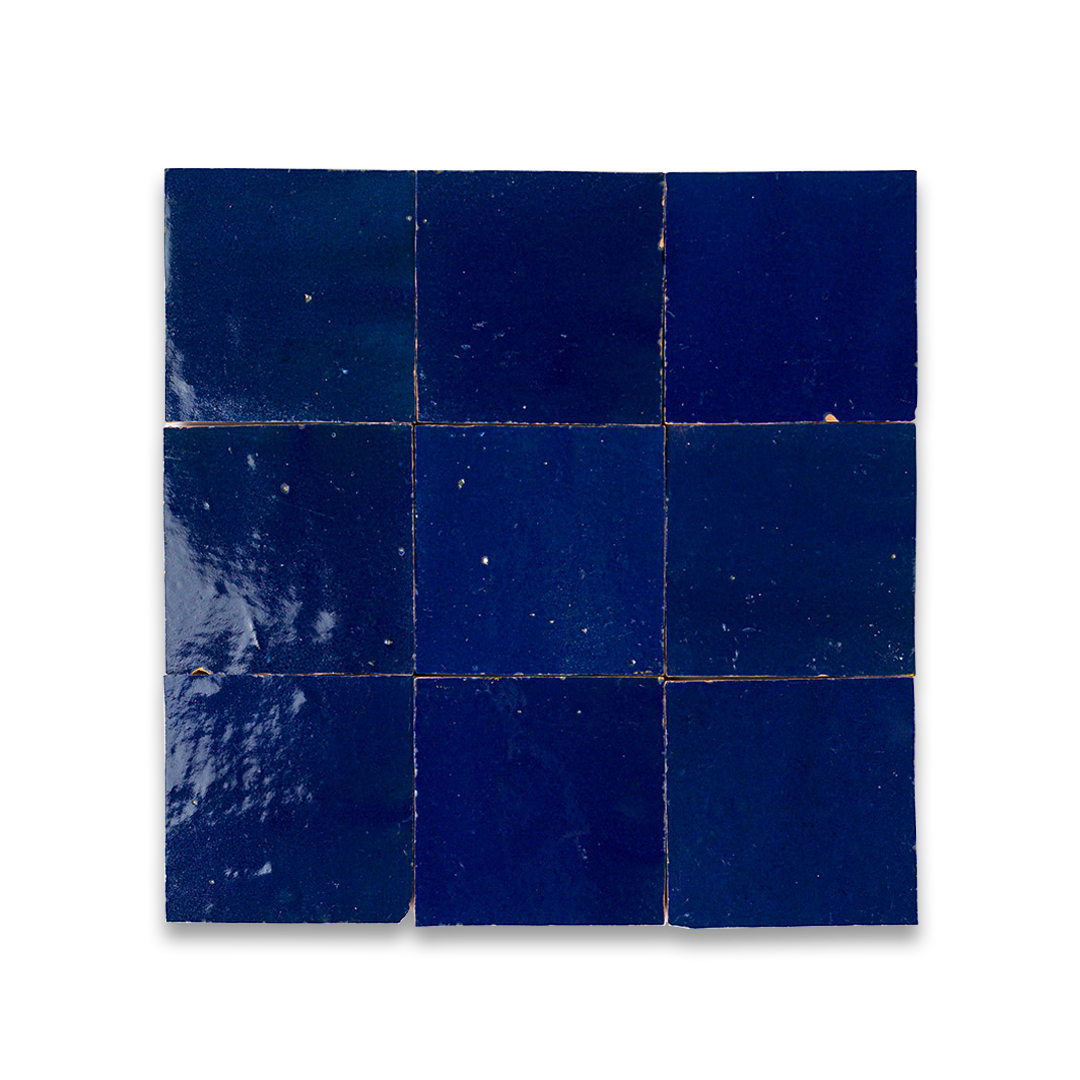 Nine square blue tiles on a white background