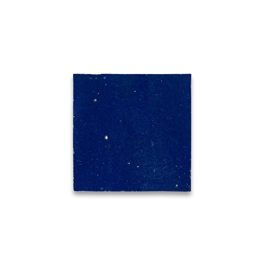 Deep blue square background with scattered white and yellow specks resembling stars in a night sky.