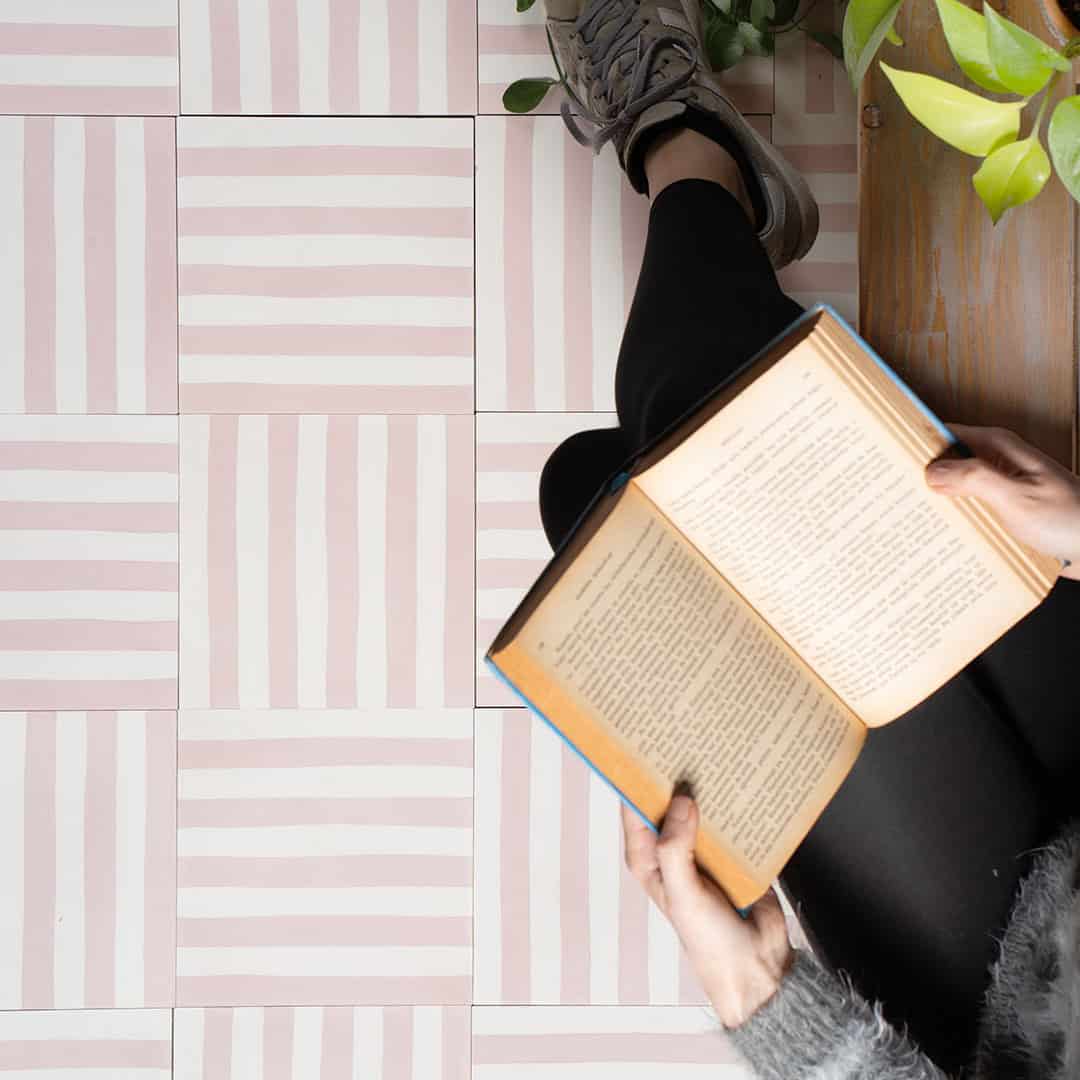 Square cement tile design featuring alternating blush pink and white vertical stripes with a smooth matte finish, ideal for modern flooring, wall cladding, or contemporary interior decor.