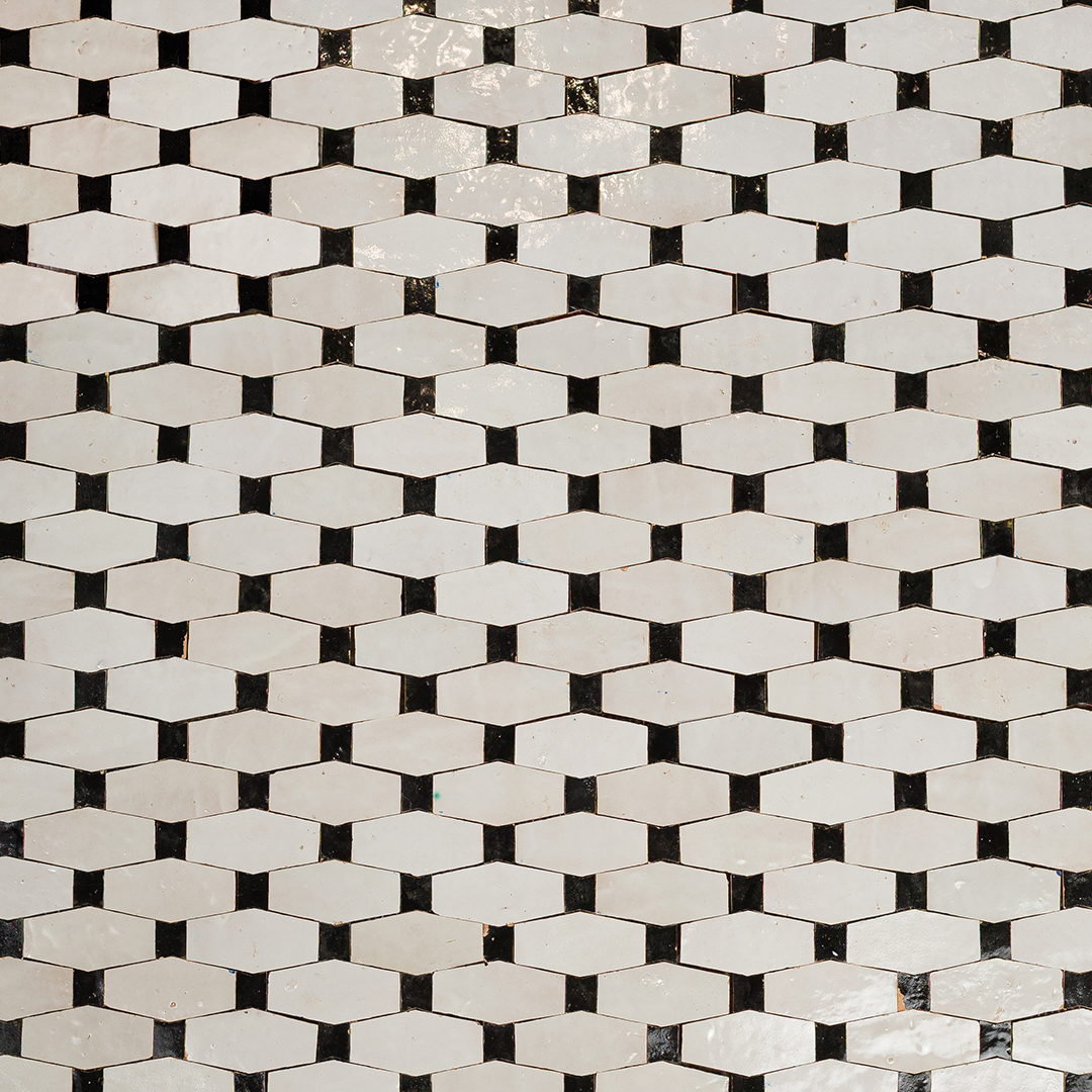 Close-up of a black and white geometric tile pattern