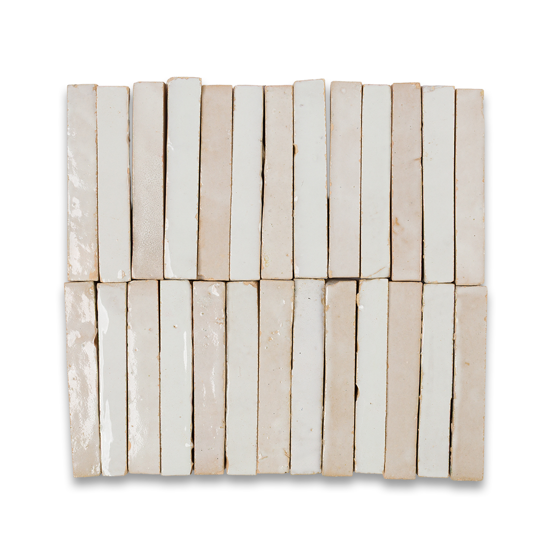 White ceramic tiles arranged on a black background, creating a striking contrast in color and texture.