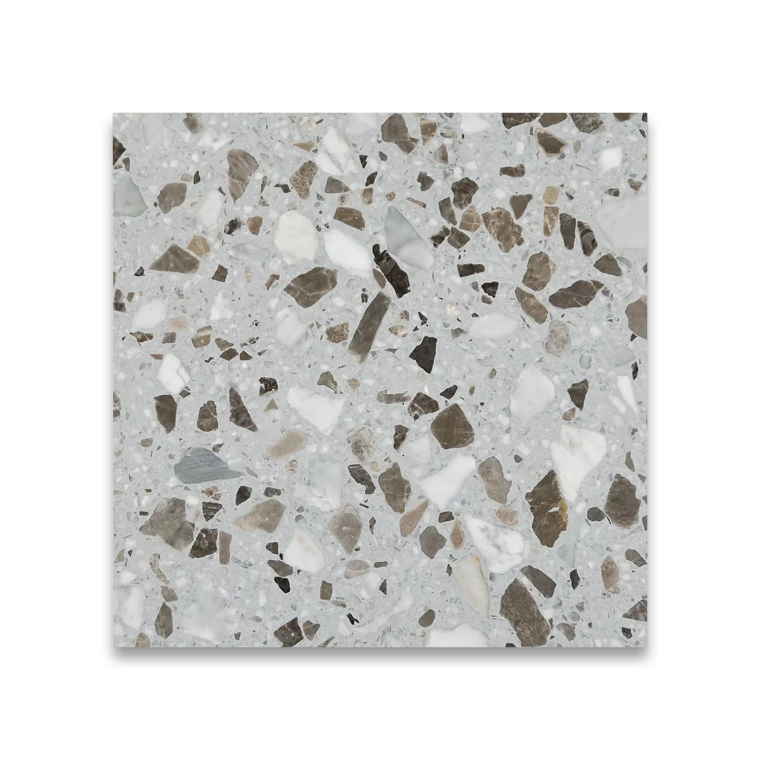 Terrazzo tile with a speckled pattern on a white background