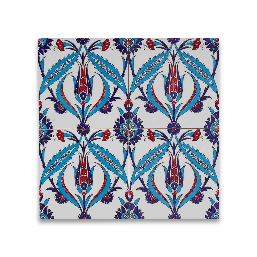 Decorative tile with intricate blue, red, and purple floral pattern on a white background
