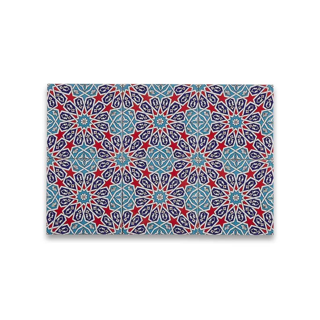 Patterned paper with blue, red, and white geometric design on a white background