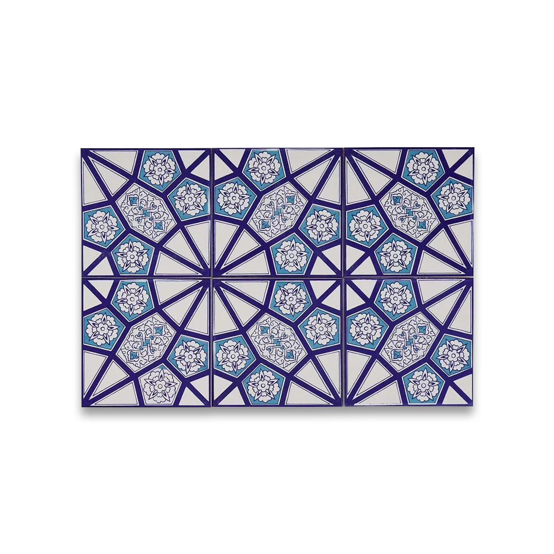Decorative tile with geometric blue and white pattern on a white background