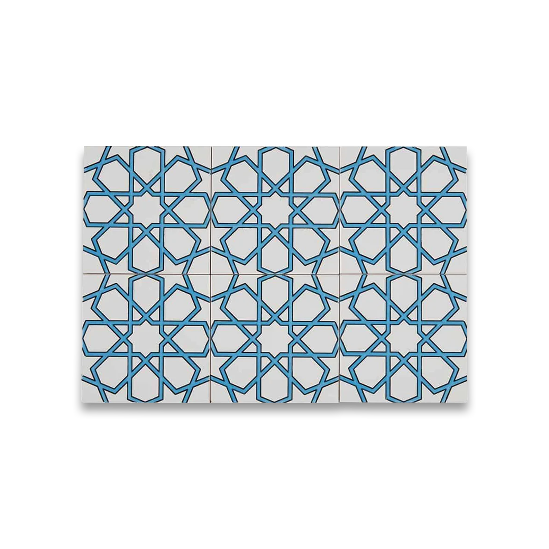 Decorative tile with geometric blue and white pattern on a white background