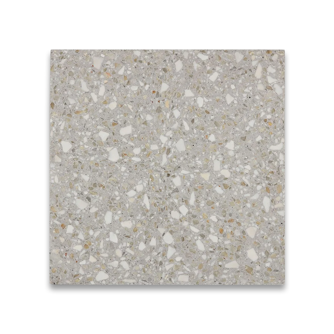 Square tile with a speckled pattern on a white background