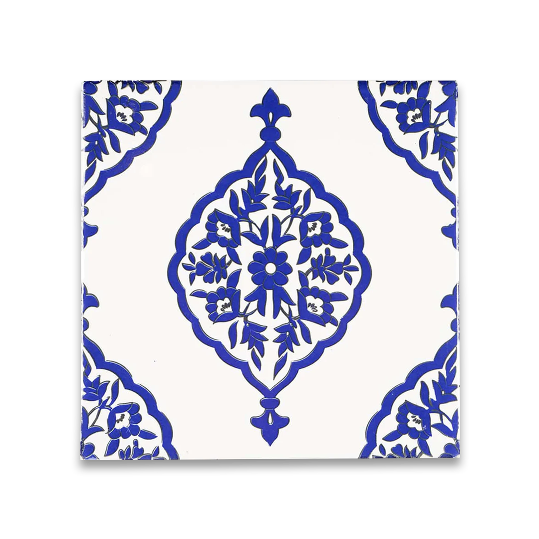Decorative tile with blue floral pattern on a white background