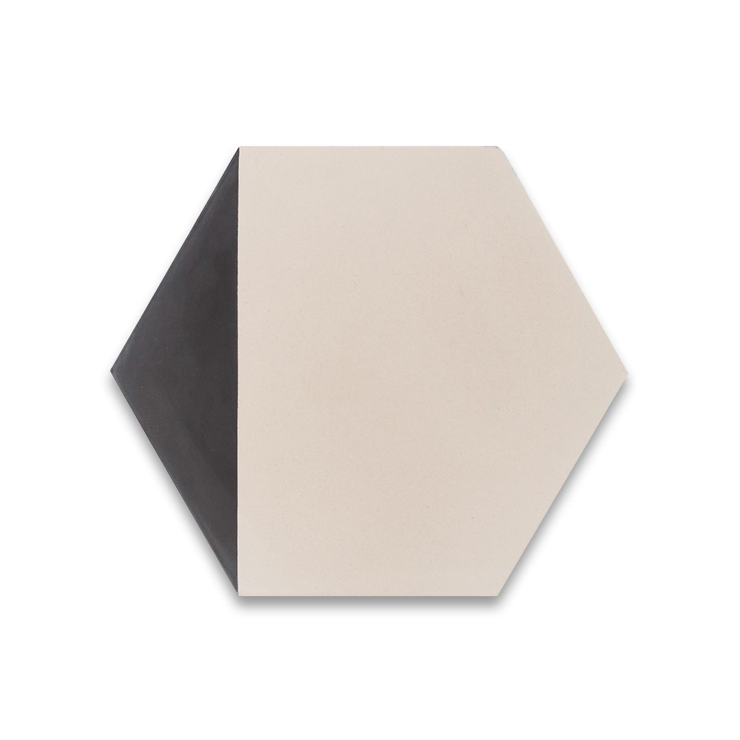 Hexagonal cement tile featuring a two-tone black and white geometric design, minimalist modern aesthetic, matte finish, ideal for contemporary flooring, wall cladding, and architectural interior applications.