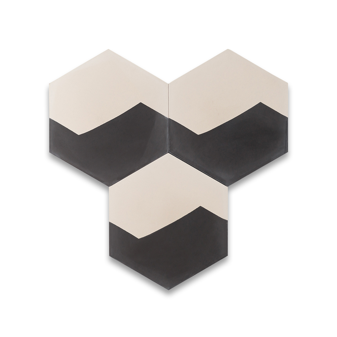 Hexagonal tiles with black and white chevron pattern on a white background