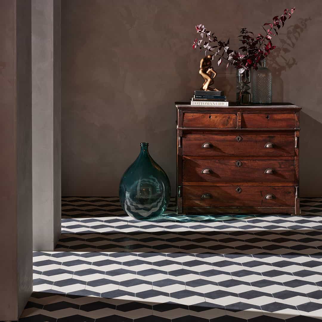 A modern black and white geometric pattern with angular contrast, matte finish, ideal for contemporary, minimalist, or Scandinavian flooring and wall décor applications.