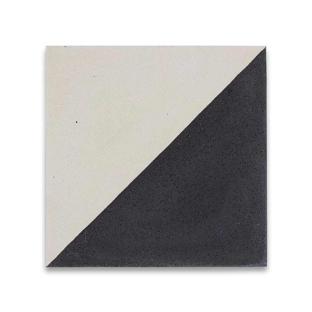 Square ceramic tile diagonally split into smooth off-white and speckled charcoal black halves, minimalist geometric design.