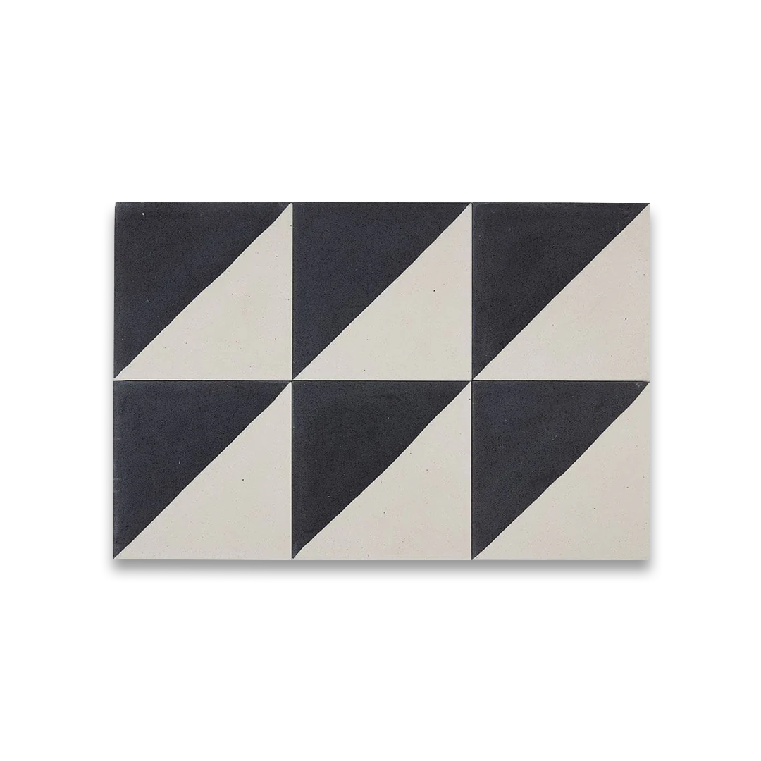 Square ceramic tile diagonally split into smooth off-white and speckled charcoal black halves, minimalist geometric design.