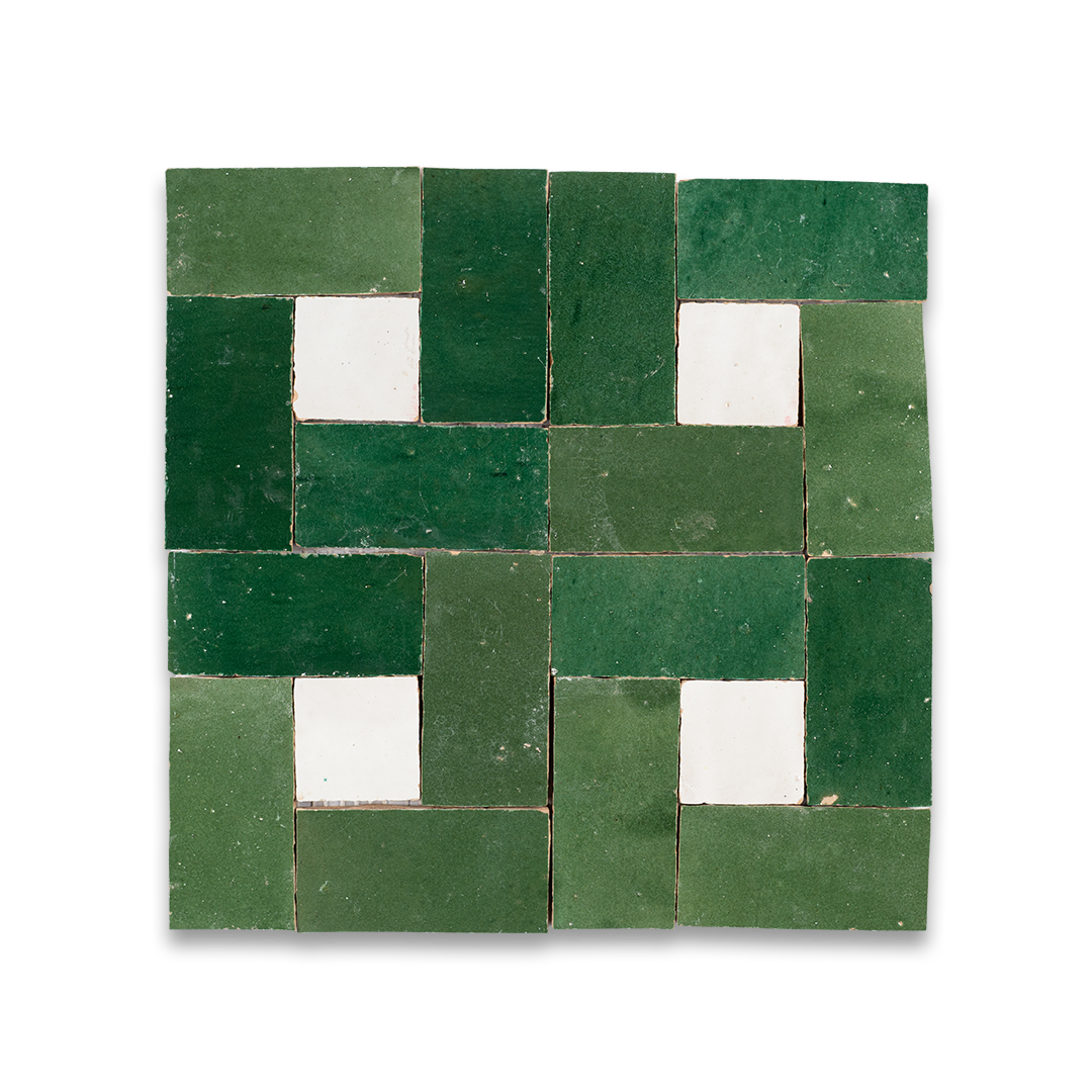 Mosaic pattern of green and white tiles on a white background