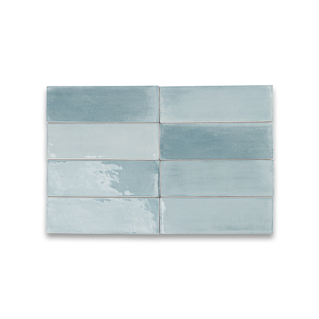 Set of six blue ceramic tiles on a white background