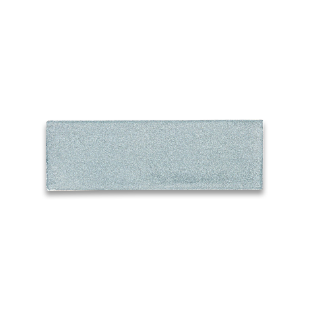 Rectangular light blue tile on a white background