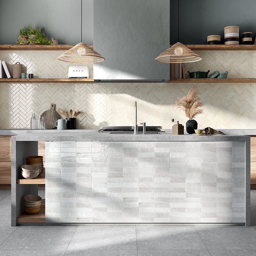 Modern kitchen with gray tiled backsplash and wooden shelves.