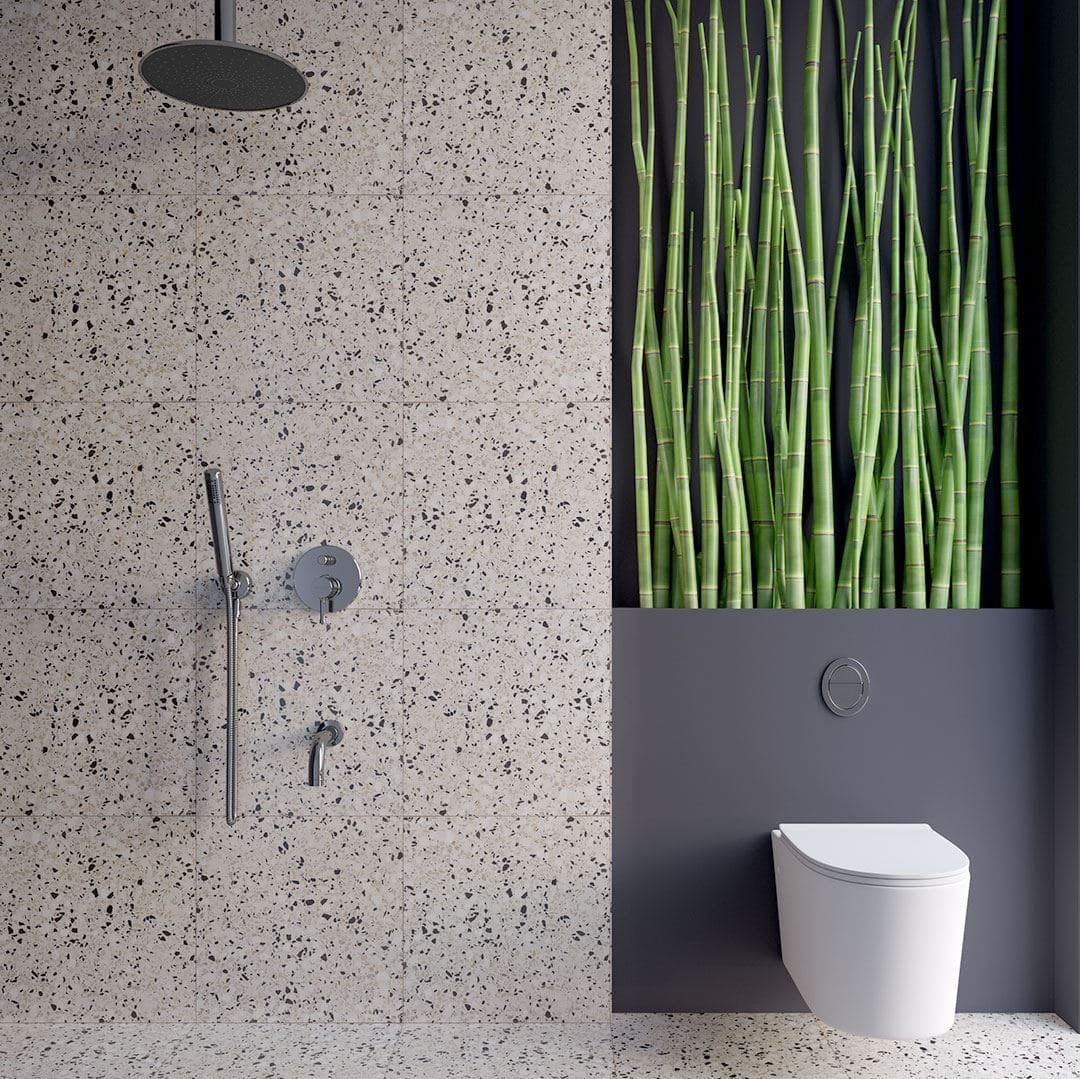 Light gray terrazzo tile surface with fine, evenly distributed stone chips in soft neutral tones.