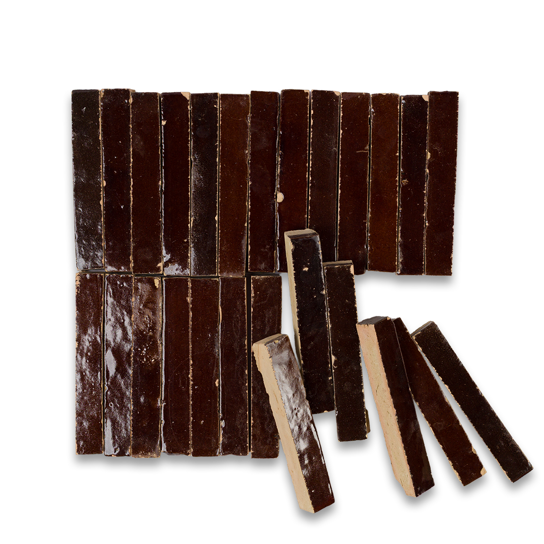 Dark chocolate bars cut into pieces on a white background