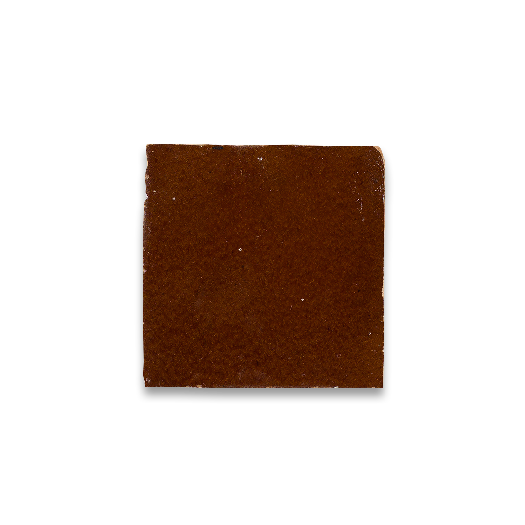 Square piece of brown material on a white background