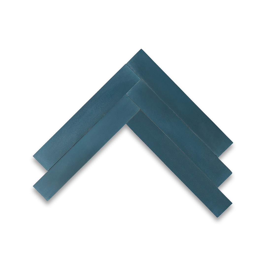 Rectangular blue metro cement tiles arranged in a herringbone pattern with a smooth matte finish, ideal for modern flooring, wall cladding, and contemporary interior design applications.