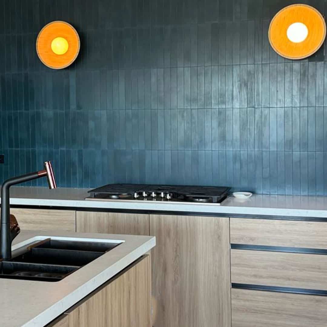 Rectangular blue metro cement tiles arranged in a herringbone pattern with a smooth matte finish, ideal for modern flooring, wall cladding, and contemporary interior design applications.