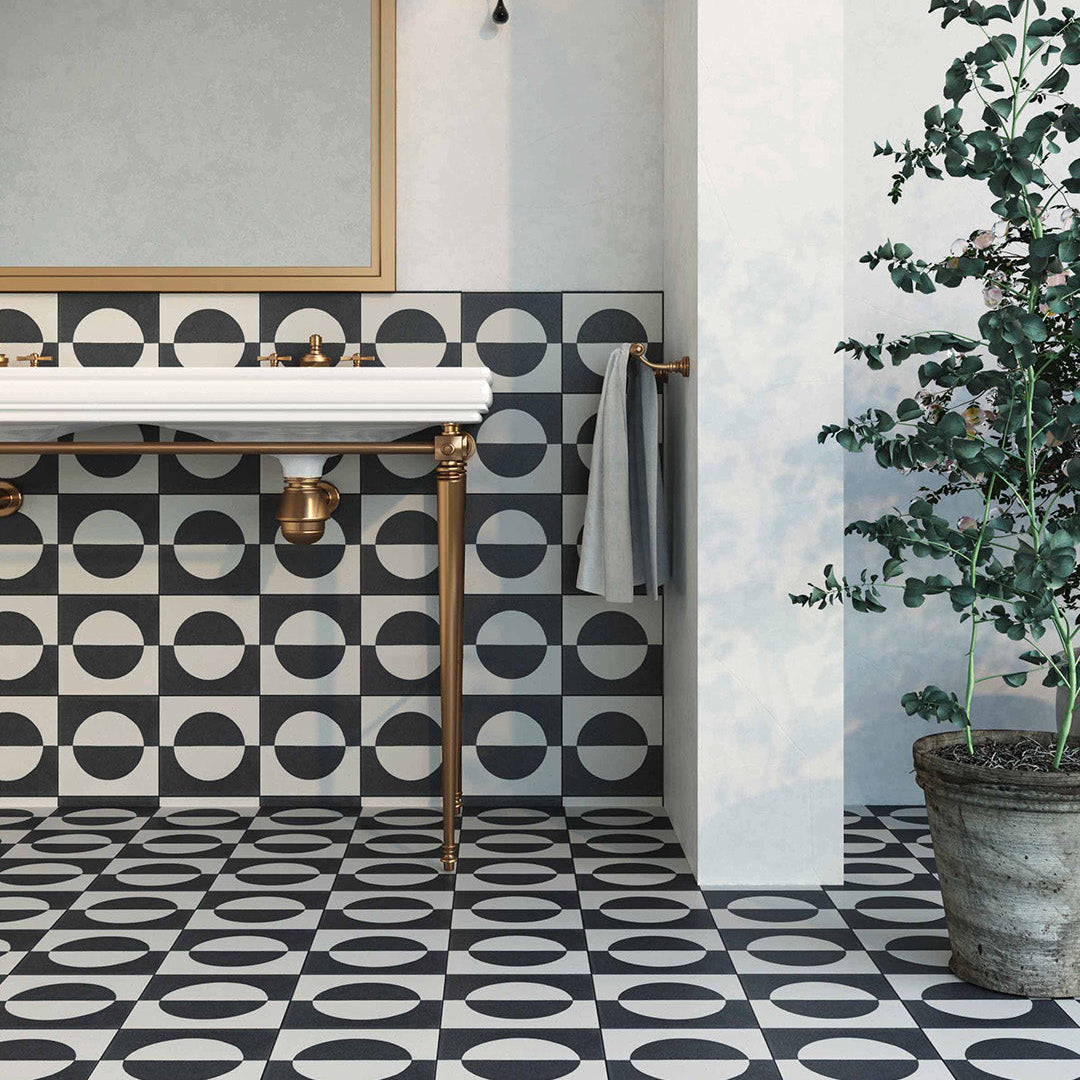 Black and white geometric cement tile featuring a bold circular half-moon pattern, minimalist modern design, matte finish, ideal for contemporary flooring, wall décor, and architectural interior applications.