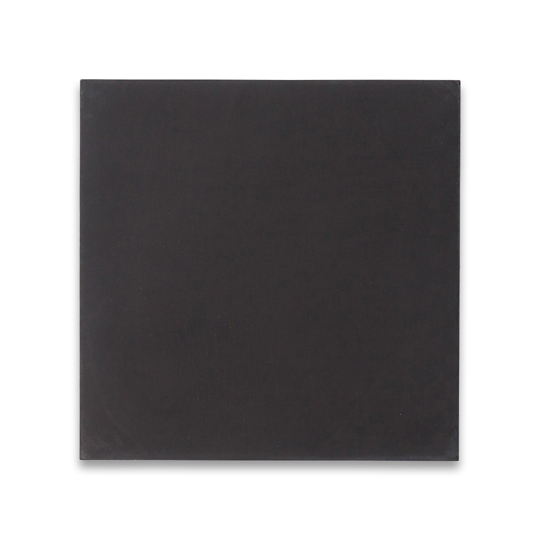 Square ceramic tile in solid black with smooth matte finish, minimalist design ideal for modern flooring.