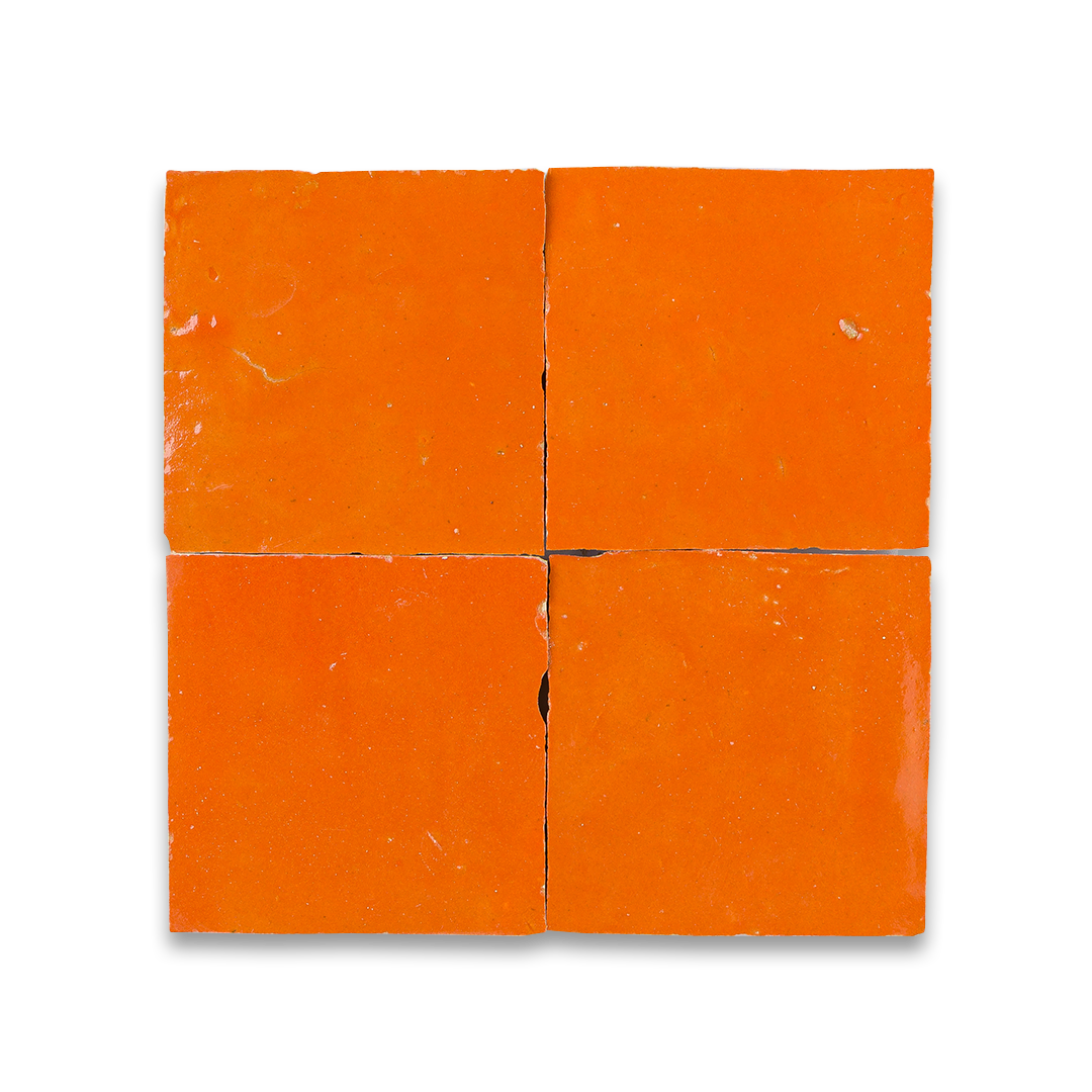 Four orange tiles arranged in a grid pattern on a white background
