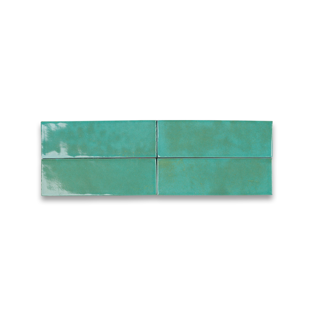 Four teal ceramic tiles arranged in a 2x2 grid on a white background